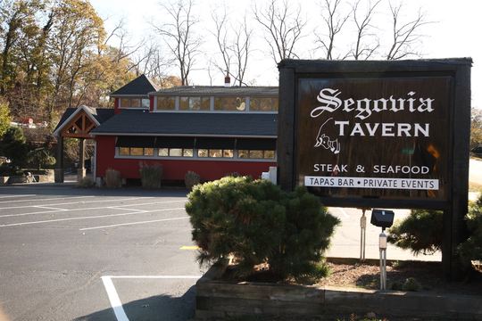 Segovia Tavern sign in autumn